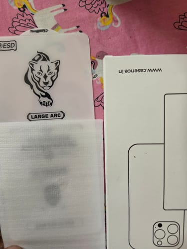 Reviewer's packaging for the UltraShield Tempered Glass, showing the protective sleeve and the outer box.