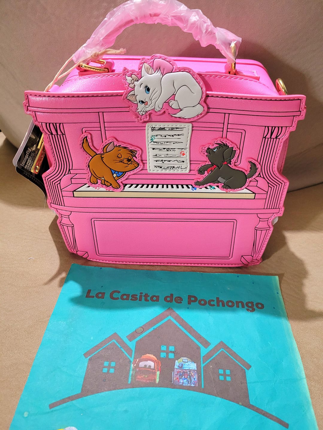 Customer photo review of Loungefly Disney The Aristocats Figural Piano Crossbody Bag