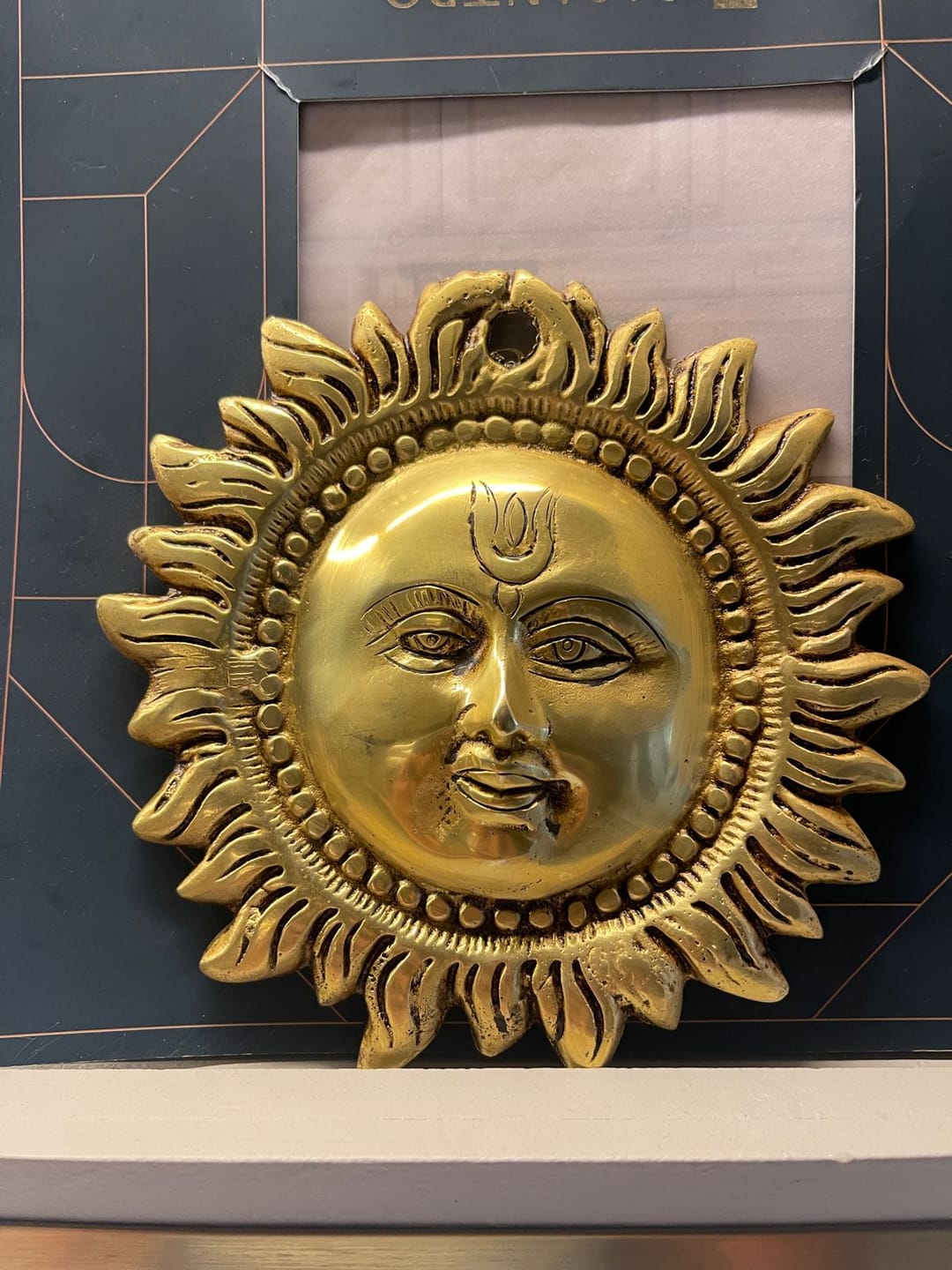 Customer photo review of Brass Vastu Sun Wall Hanging Idol Vastu Remedy for East Direction Balance, Fame and Positive Energy for Home, Office and Entrance Decor | 15 x 15 cm | 940 gm