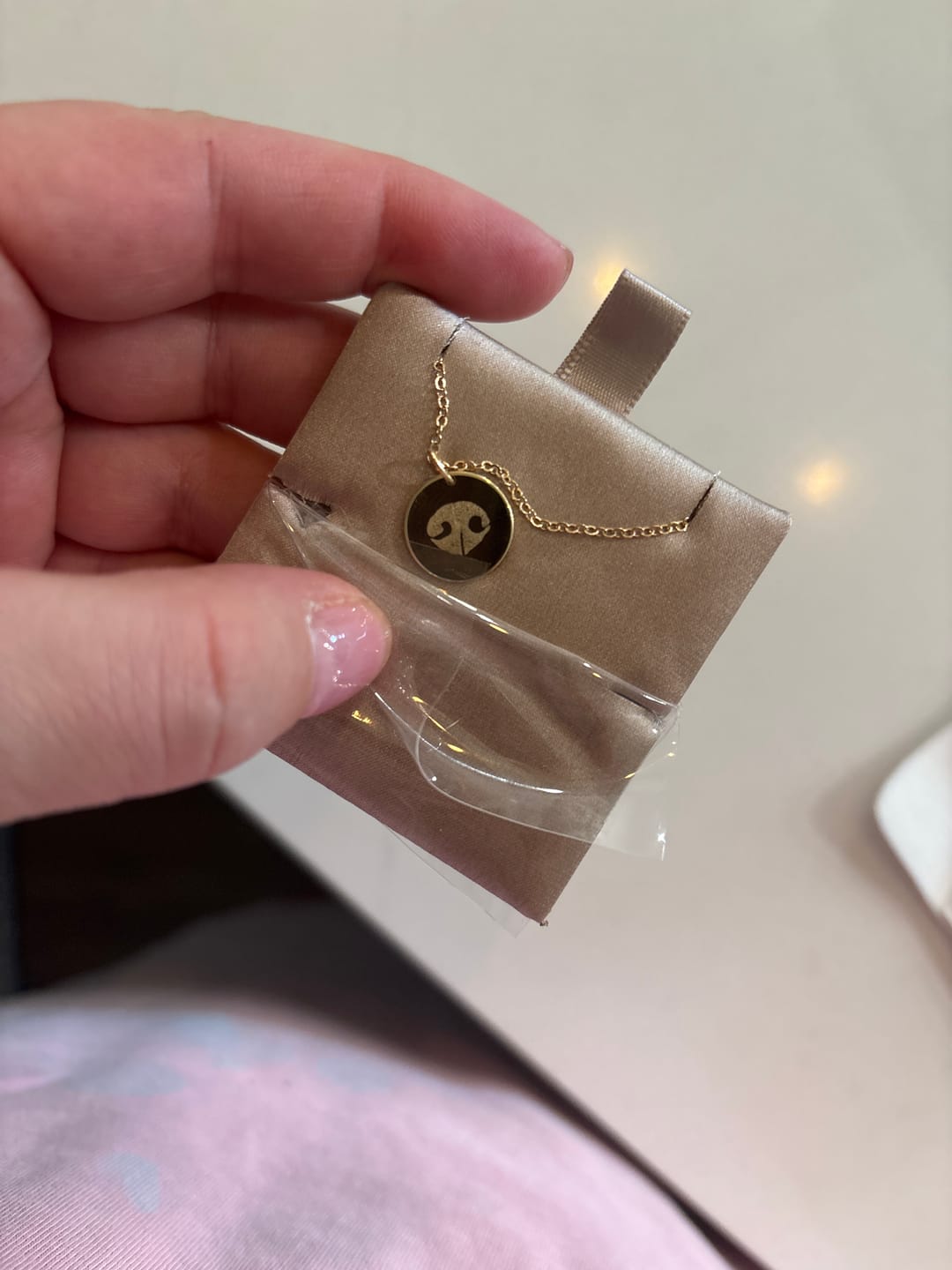 Customer photo review of Akela Medium Noseprint Necklace