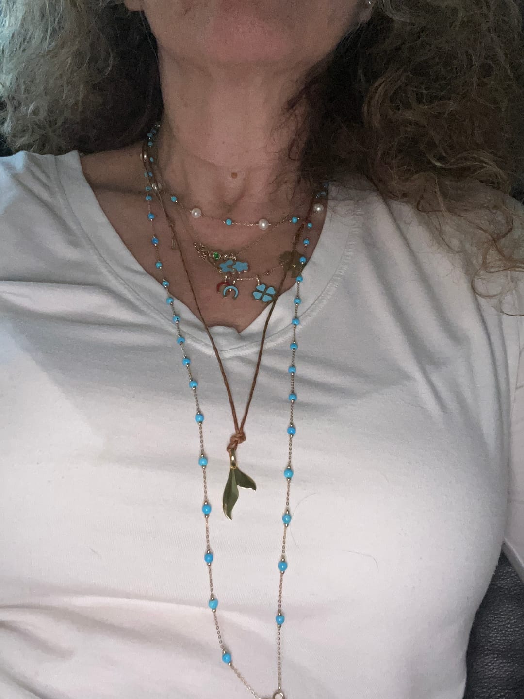 Customer photo review of Nava Zahavi Leather Necklace with 14K Gold Tail Pendant