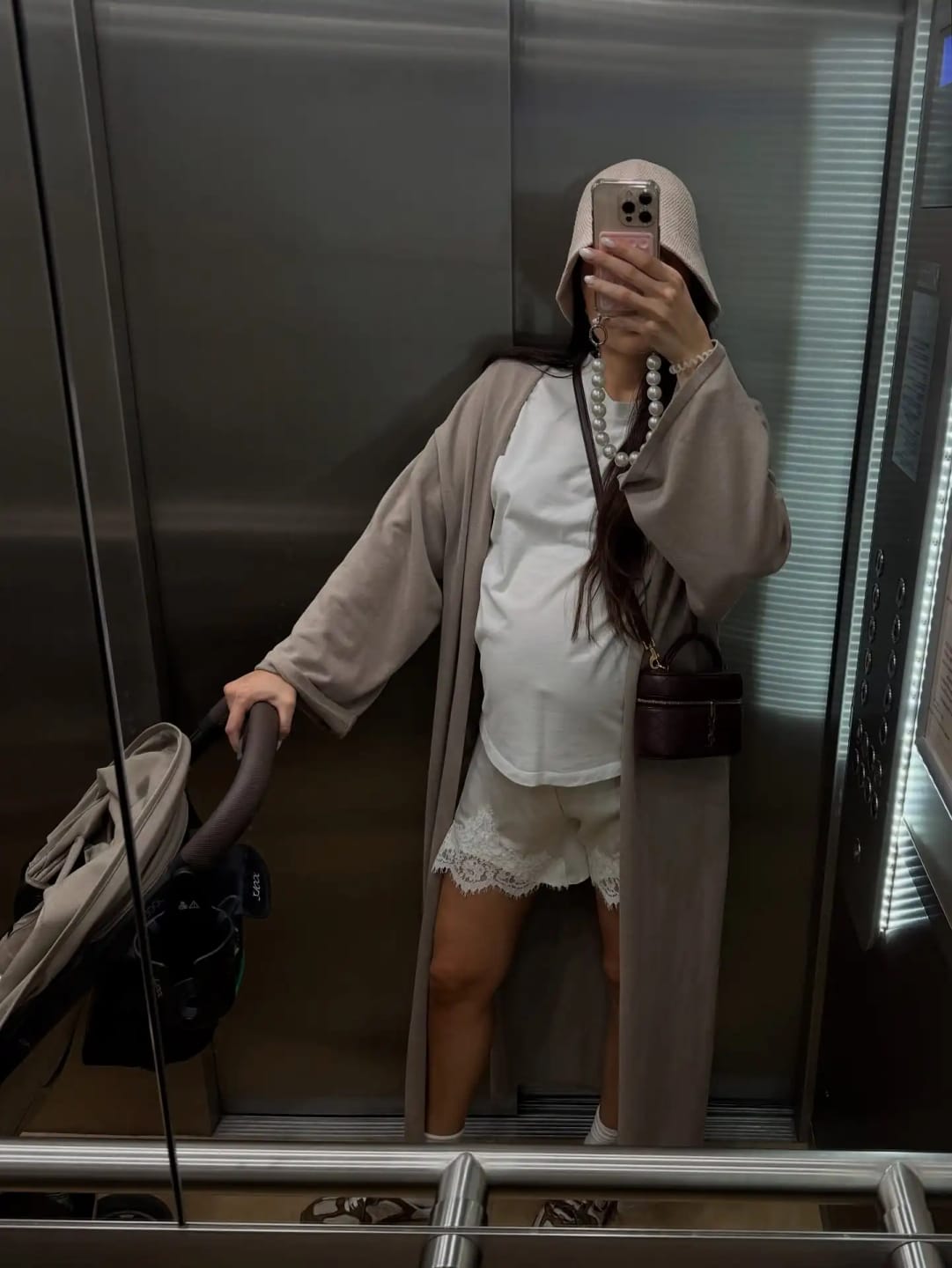 Customer photo review of Aella Satin Lace Shorts