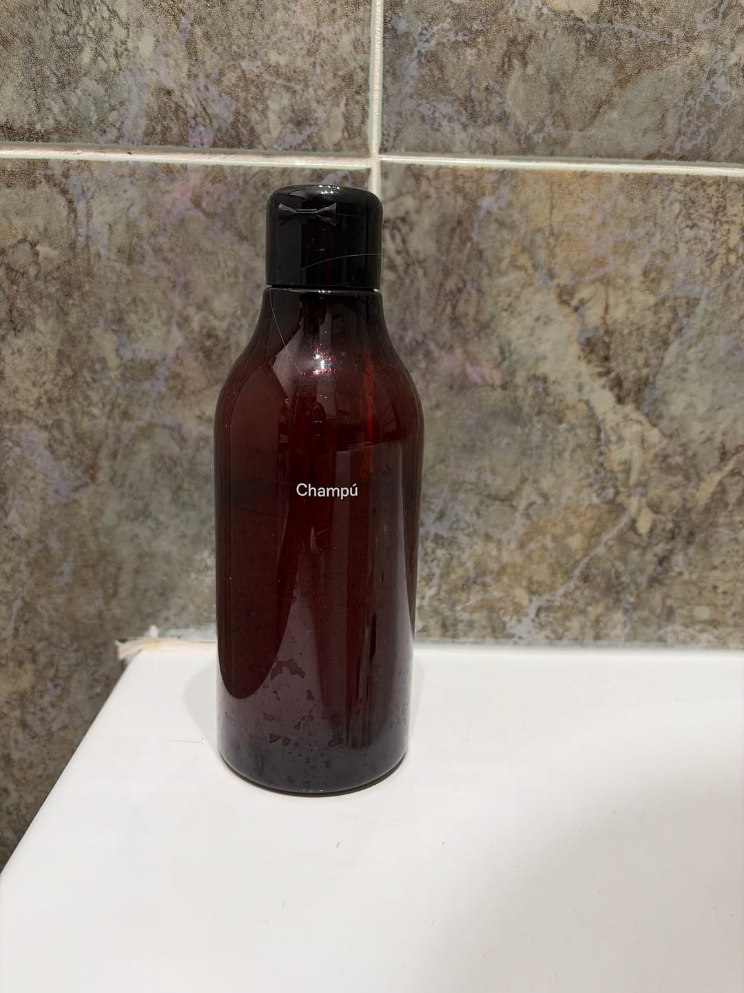 Customer photo review of Botella Soluto Champú