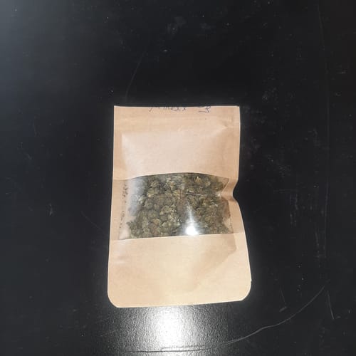 Kundenbild von Amnesia Haze PHC in einem braunen Beutel mit Sichtfenster.