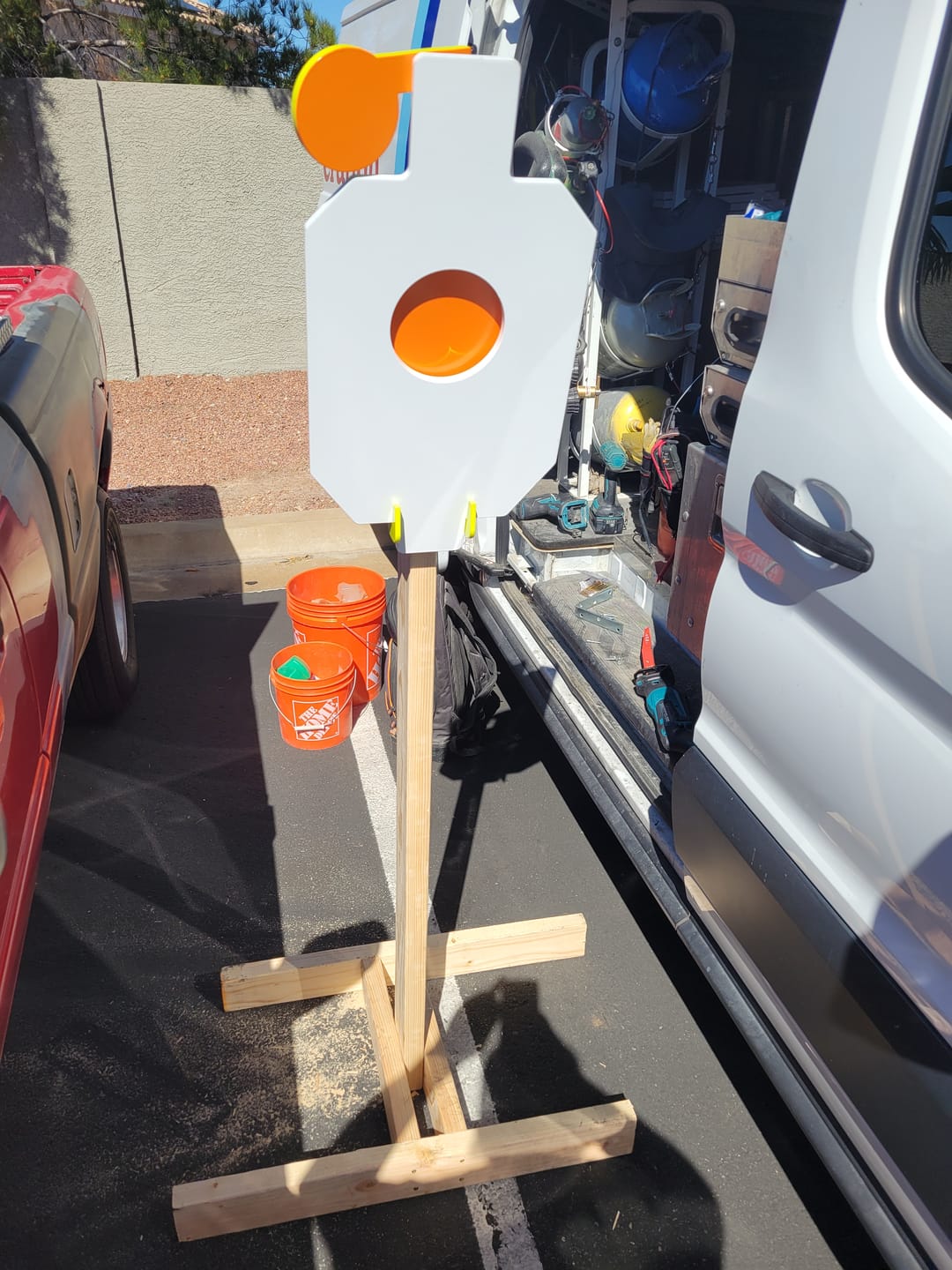 Customer photo review of AR500 Steel Hostage Target 12" x 20" x 1/2" Armored Steel Bullseye Reactive Target with 2X4 & T-Post Bracket
