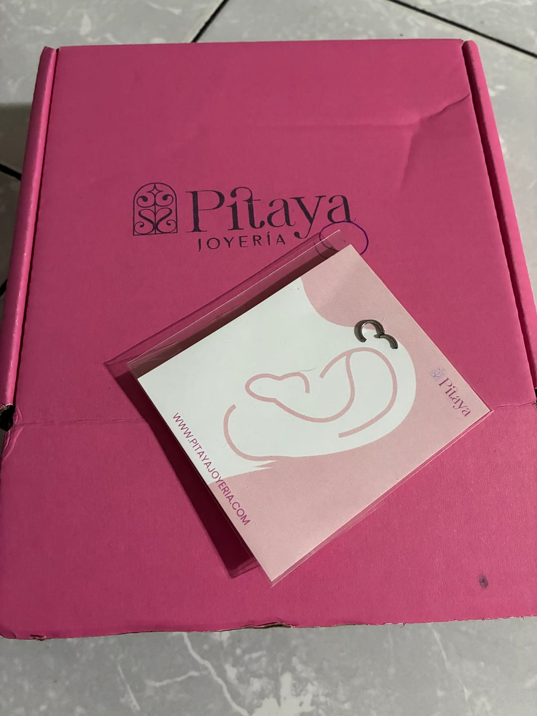 Customer photo review of Piercing Infinity con Zirconias Titanio