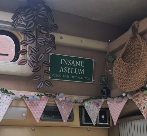 Customer photo review of Sign - Cast Iron 'Insane Asylum'