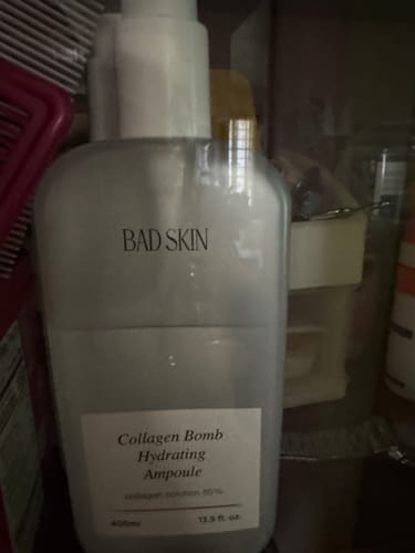Customer's bottle of the Bad Skin Collagen Bomb Hydrating Ampoule on a shelf.