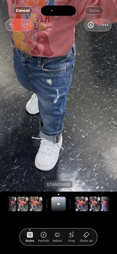 Customer's toddler wearing the white Classic VN shoes with cuffed jeans.