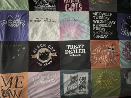Customer's custom Project Repat T-Shirt Quilt made from a collection of cat-themed t-shirts.