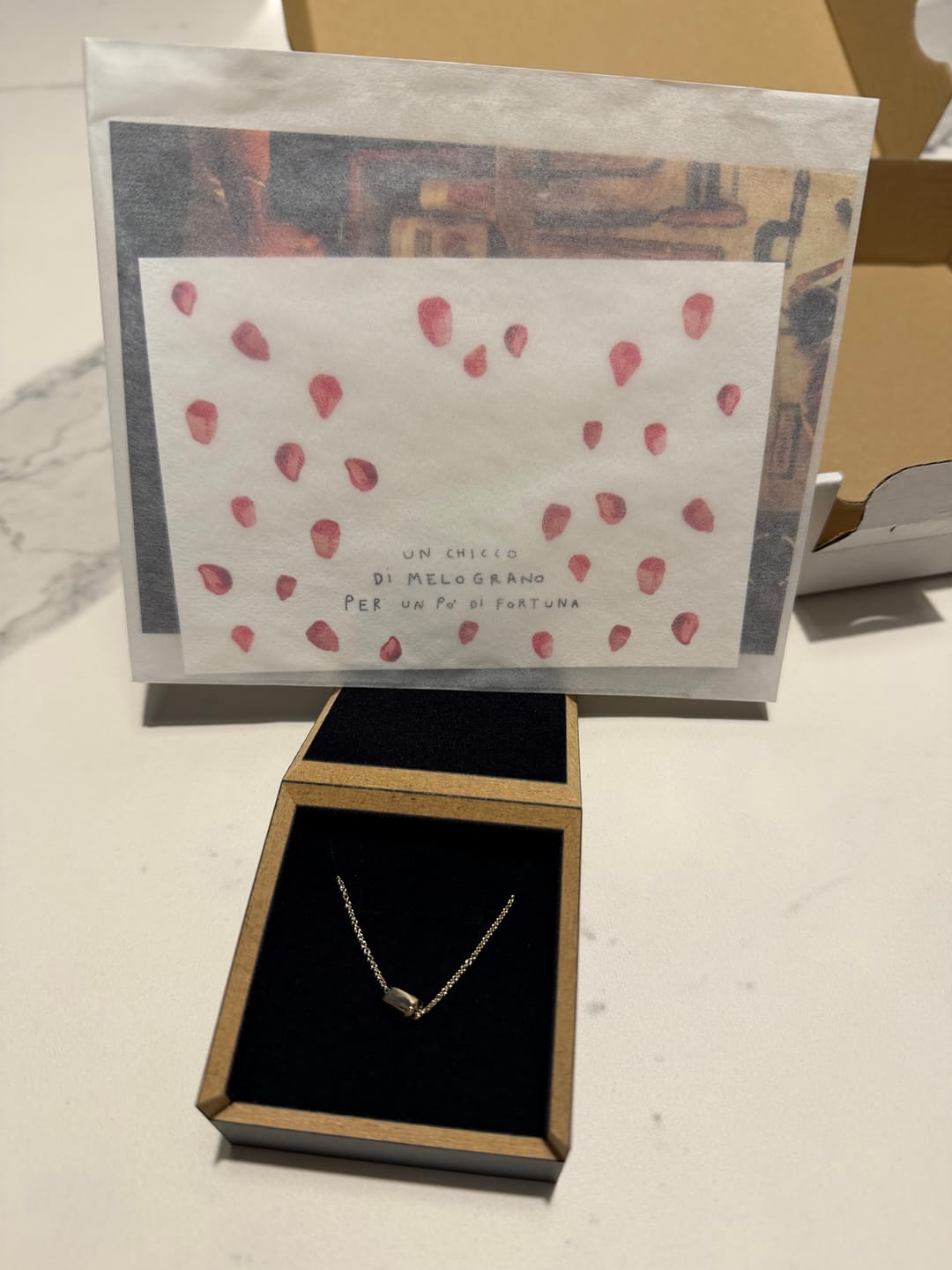 Customer photo review of Pomegranate Seed Necklace