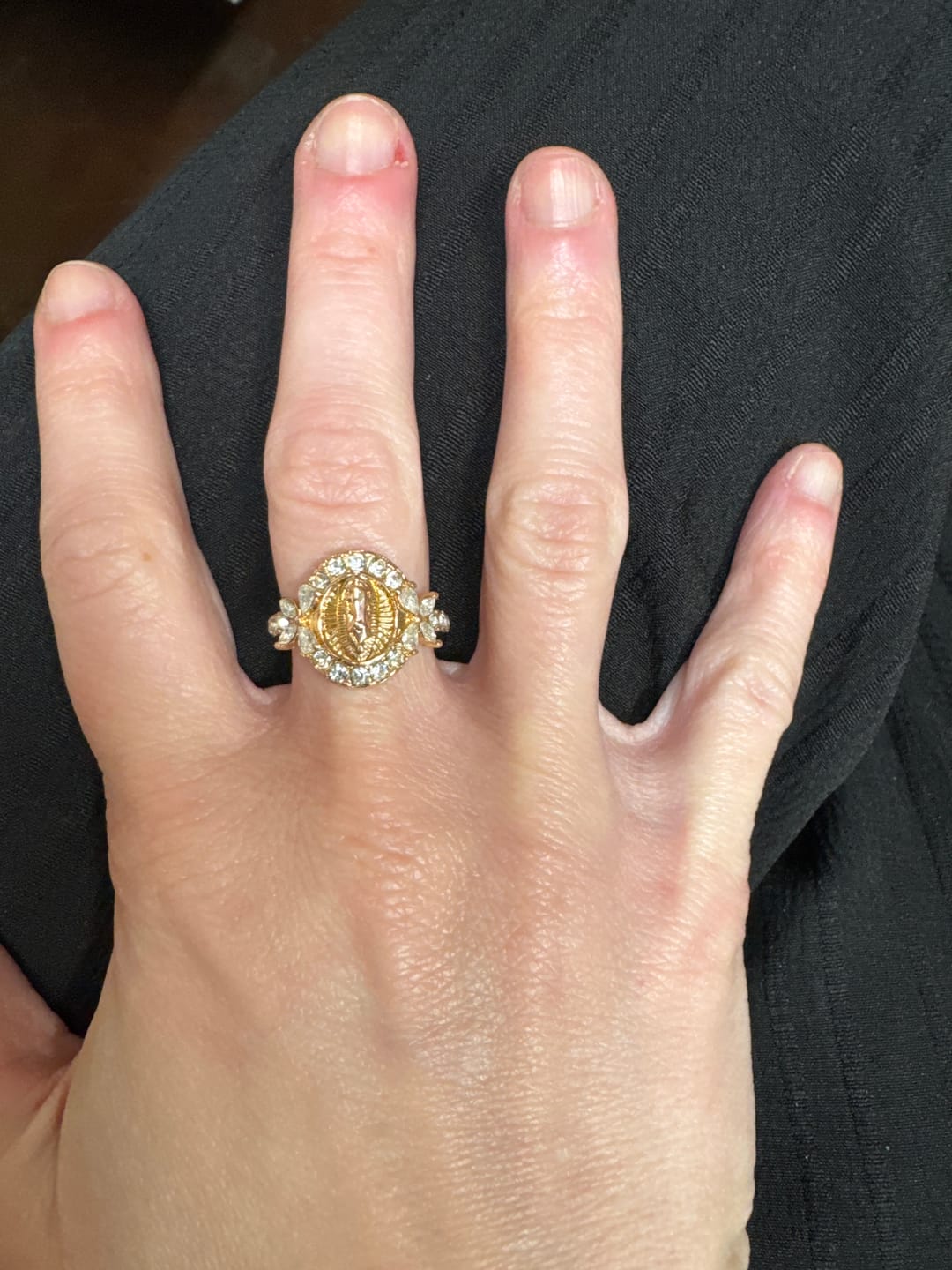Customer photo review of Christianartworkshop Elegant Virgin Mary Emblem Ring: Sacred Detail for Daily Devotion