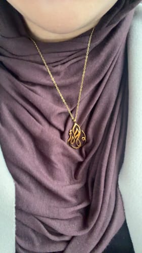 Customer photo review of Tawakkul | توكل Calligraphy Necklace