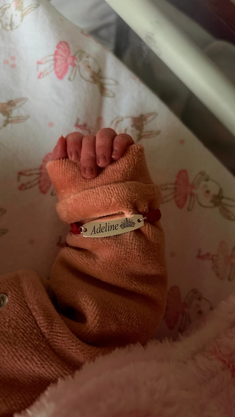 Customer photo review of pulsera protección personalizada bebé o nino/a plata