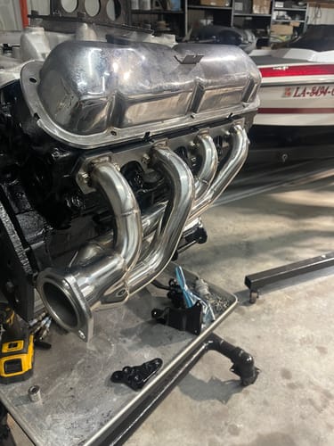 Customer's shiny Exhaust Header installed on a V8 engine block for their performance 289 project.
