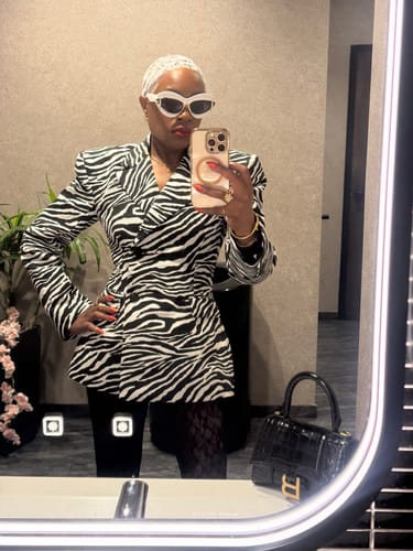 Reviewer's mirror selfie showing the fit and pattern of the Suiting Zebra Jacquard Blazer.