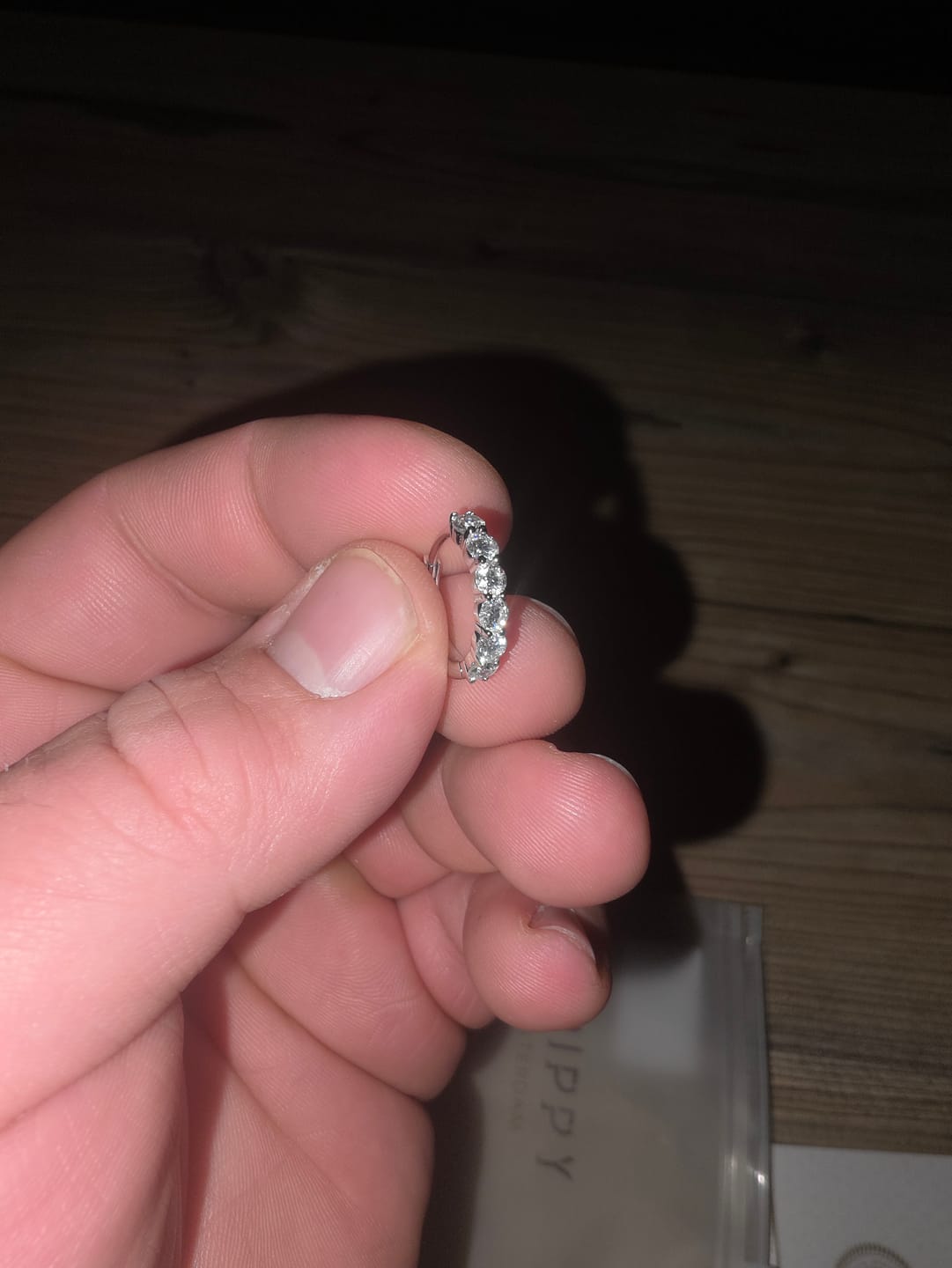 Customer photo review of MOISSANITE ETERNITY EARRINGS.