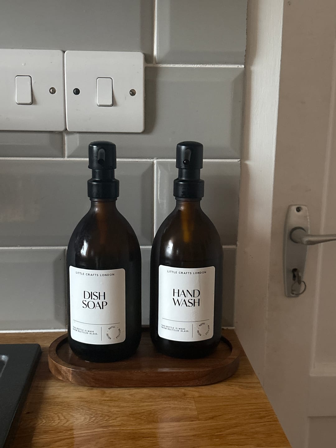 Customer photo review of Set of 2 Frosted Amber Glass Bottle 500 ML with Metal Pump & Small Tray White Label