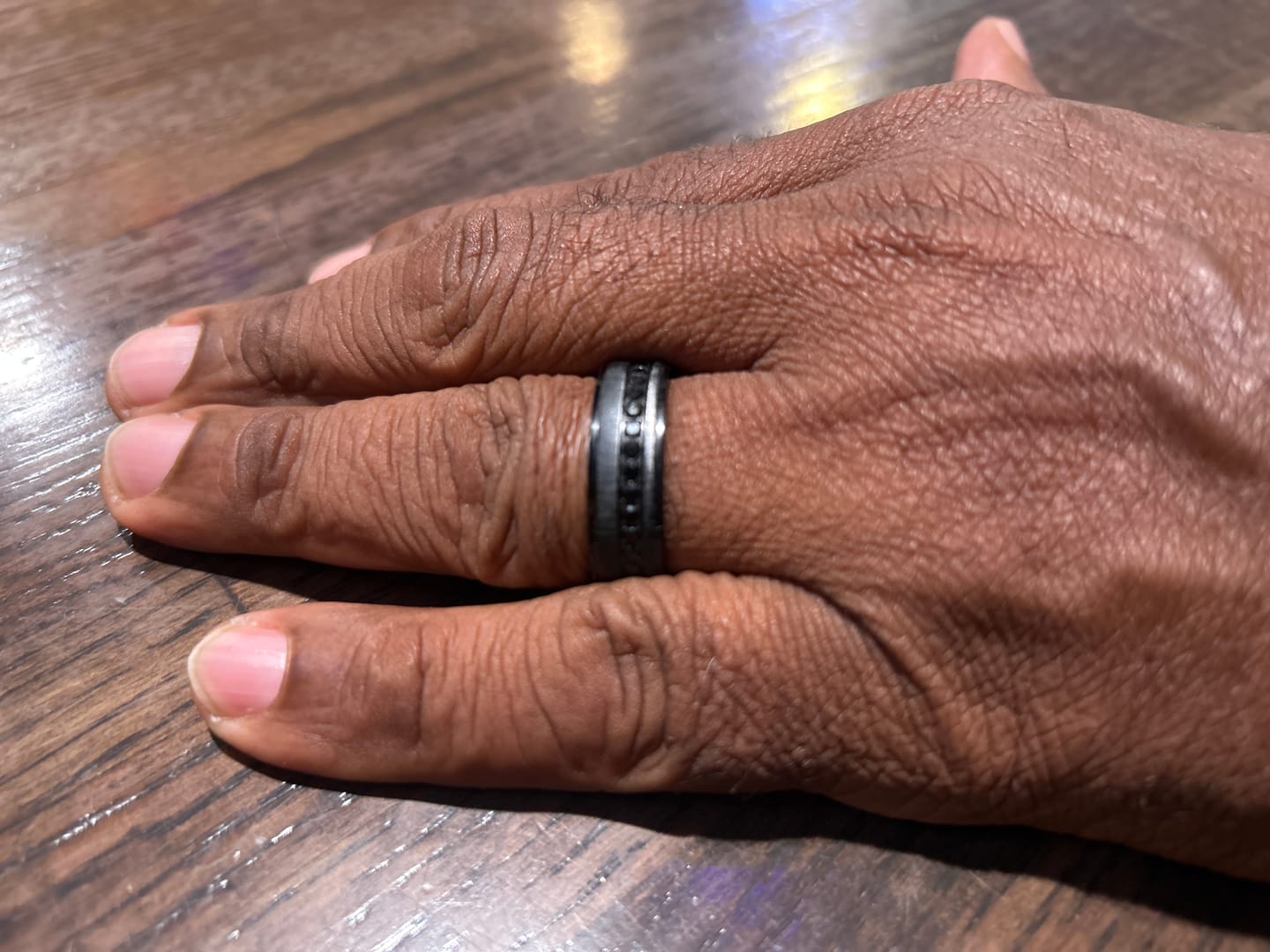 Customer photo review of 8mm Black Titanium Wedding Ring with Round Black Diamonds
