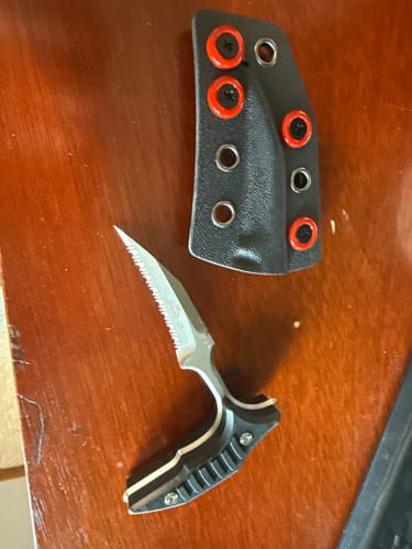 Customer photo review of MicroTech Double Bee Shape Push Dagger - Serrated Blade