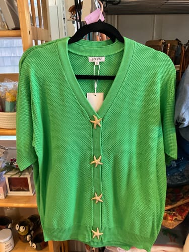 Customer photo review of WOMEN'S SHORT SLEEVE BUTTON CLOSURE SWEATER BLOUSE