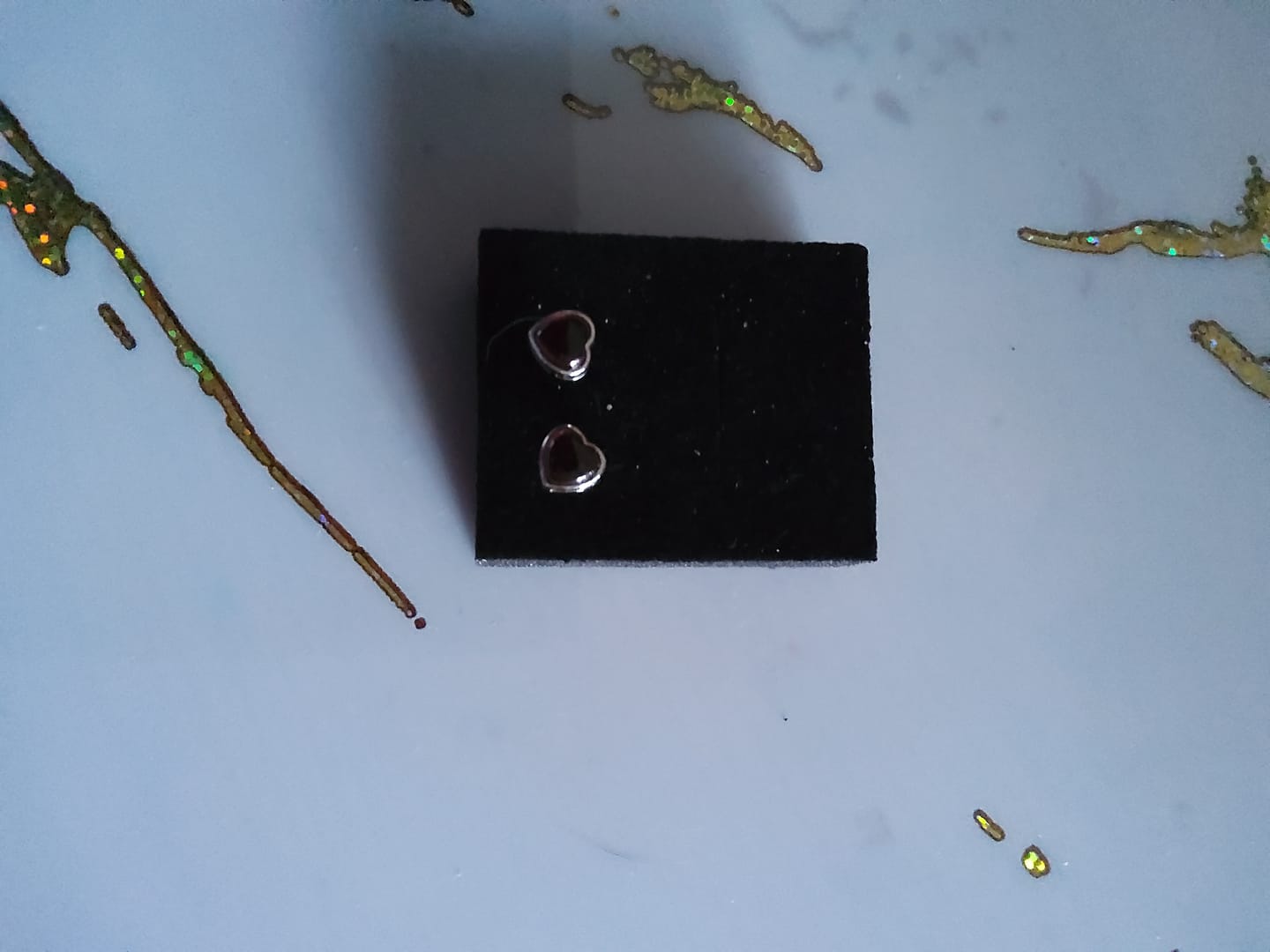 Customer photo review of Boucles d'Oreilles "Coeur Passion" en Grenat & Argent