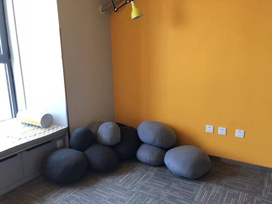 Customer photo review of Stone Pouf Boulder Pillow – Soft Sculptural Floor Cushion | GabyBerg