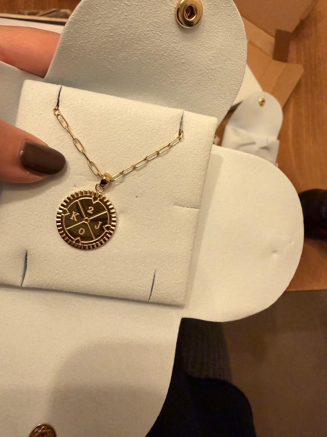 Customer photo review of Engravable Compass Necklace