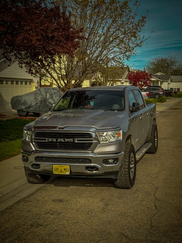 Customer's grey Ram truck with 1.5 Inch Hubcentric Wheel Spacers installed, showing a wider, aggressive stance.