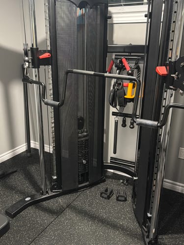 Customer photo review of THE ANDREONI BAR - A revolutionary cable machine attachment.