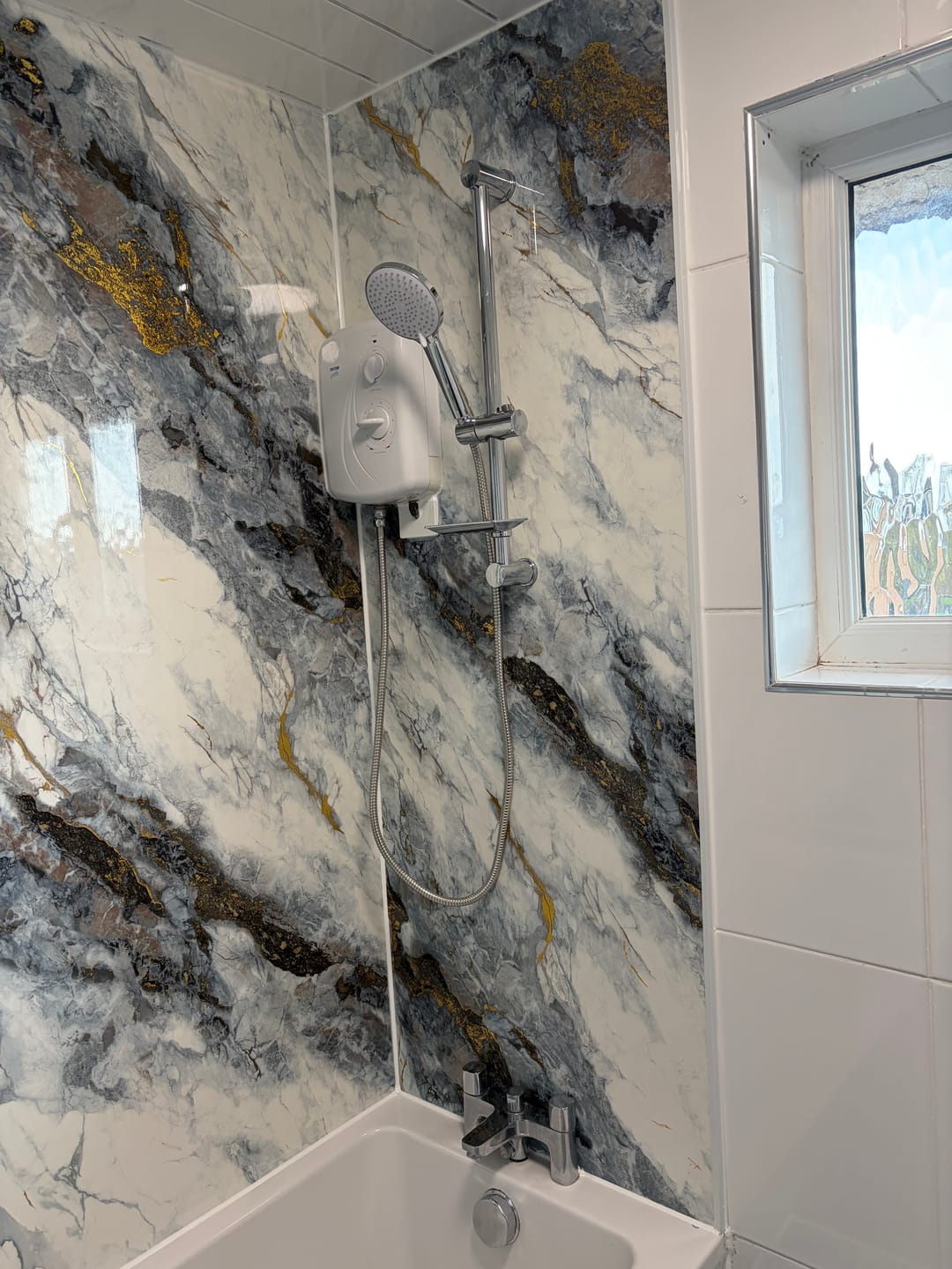 Customer photo review of 10mm Ocean Blue Gloss Shower Panel 1M x 2.4M