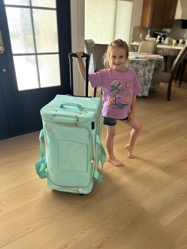 Customer photo review of Glam'r Gear Mobile Changing Station™ Dance Duffel Bag with Built-In uHide® Rack