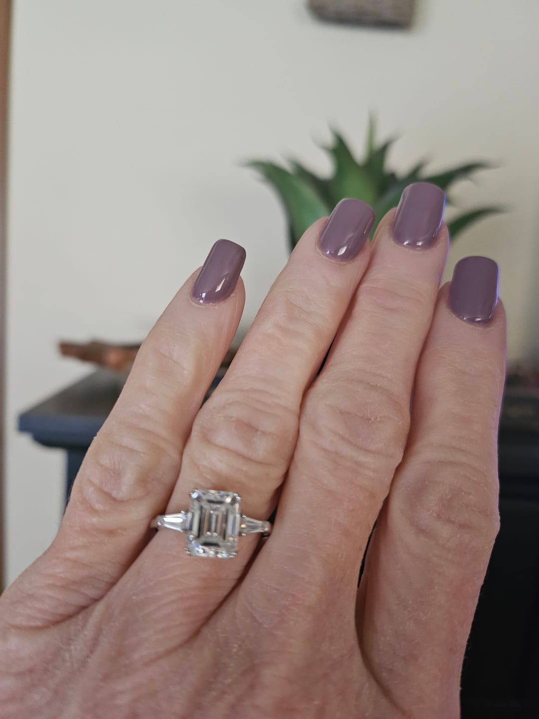 Customer photo review of Three Stone Emerald Cut Moissanite Tapered Baguette Engagement Ring