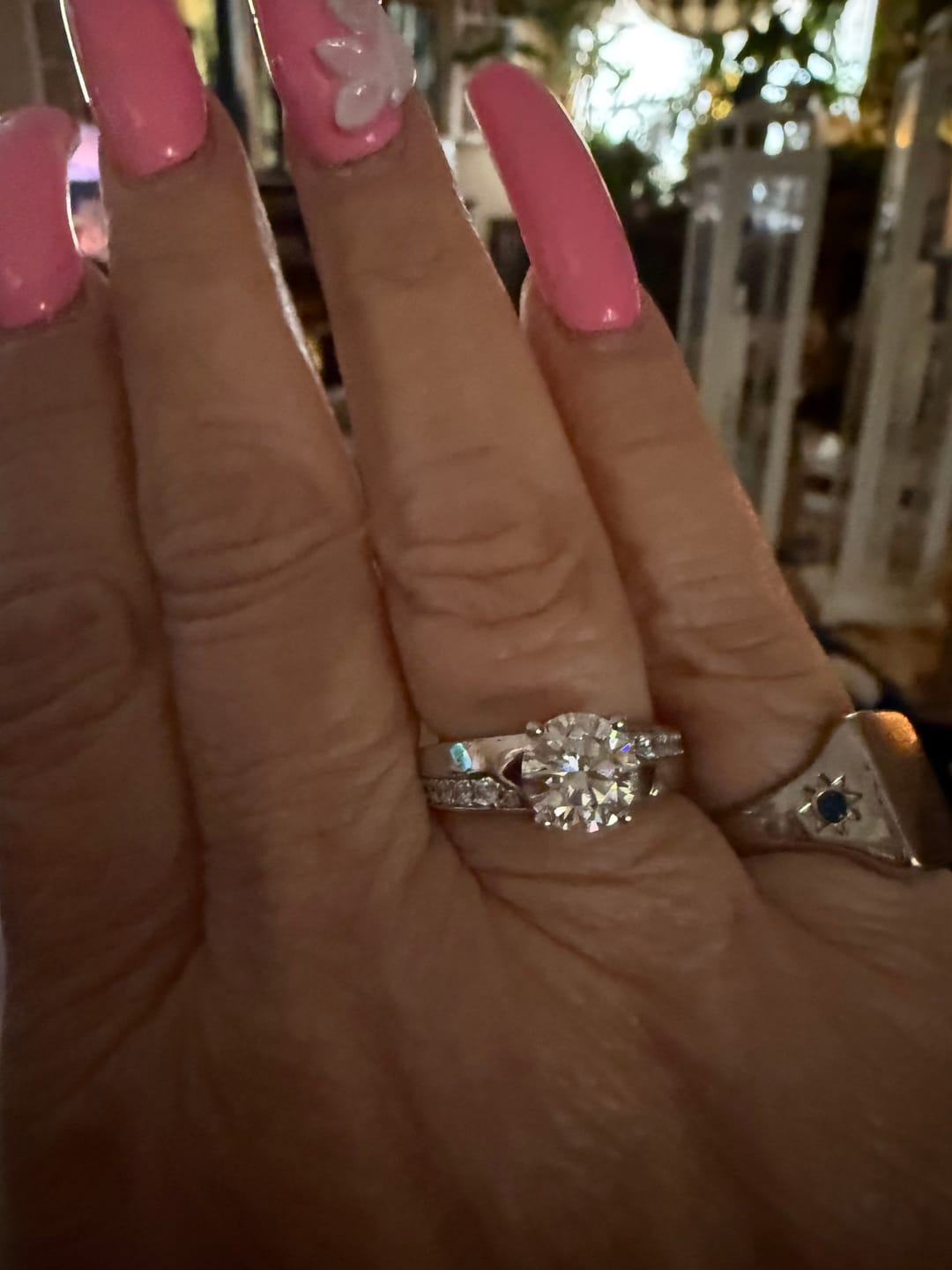 Customer photo review of Round Moissanite Offset Side Stone Row Engagement Ring
