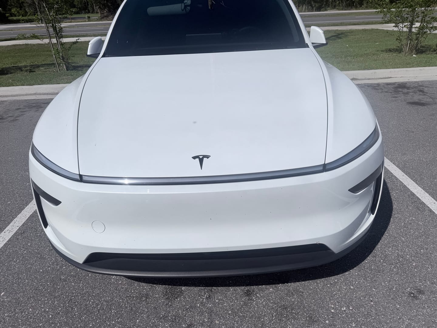 Customer photo review of EVAAM® "T" Emblem Front & Rear Badge Replacement Full Set for Tesla Model 3/Y (1 Pair)