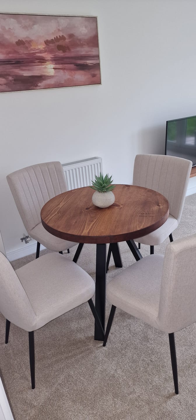Customer photo review of Round Dining Table