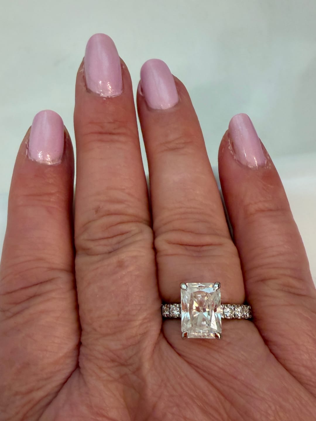 Customer photo review of Darcy 3.5 Carat Radiant Cut Hidden Halo Moissanite Engagement Ring in 18k White Gold