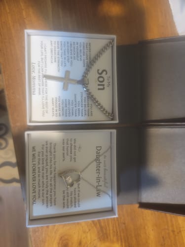 Customer's 'To My Son' artisan cross gift set in its box, shown above another gift box for a daughter-in-law.