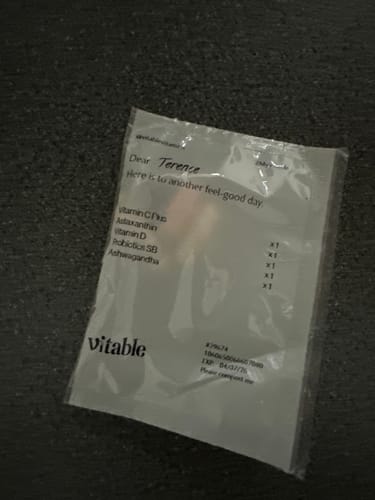 Customer's personalized daily vitamin packet which lists Vitamin D as one of the supplements inside.