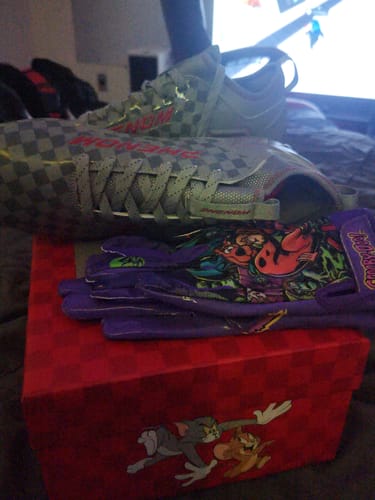 Customer photo review of Tom and Jerry "Cheddar Chase" Football Cleats - Quantum Speed by Phenom Elite
