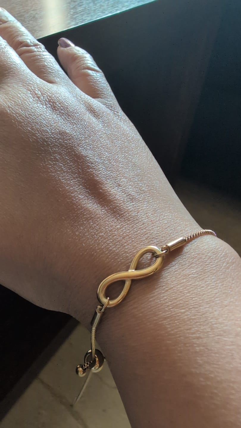 Customer photo review of Heart Rays Necklace