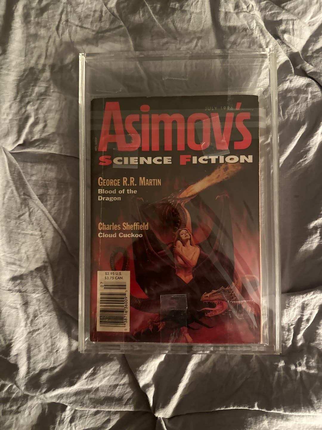 Customer photo review of Acrylic Slide Back Book Display Cases