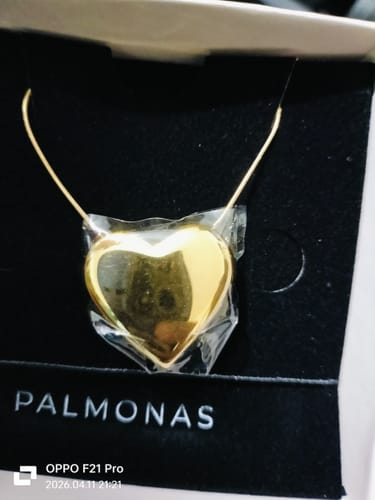 Customer photo review of Golden Heart Embrace Necklace