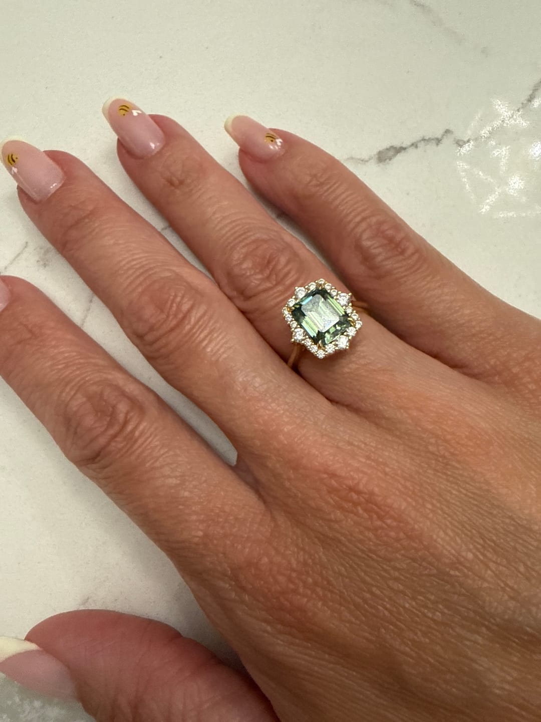 Customer photo review of S925 Moissanite 3.0Ct 18K Gold Plated Halo Emerald Stone Emerald Cut Engagement Ring For Women