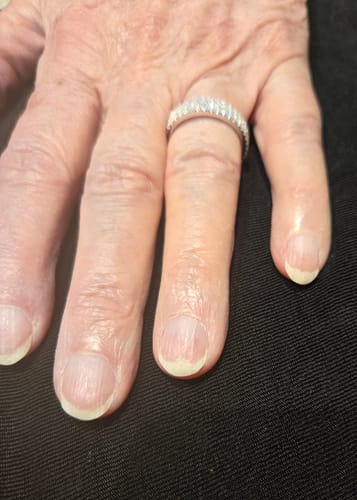 Customer photo review of Triple Row Pavé Moissanite Eternity Wedding Band