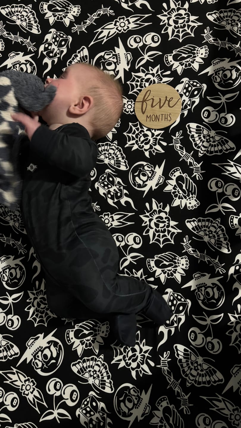 Customer photo review of Bamboo Crib Sheet in Bad Boy [Midnight Edition]