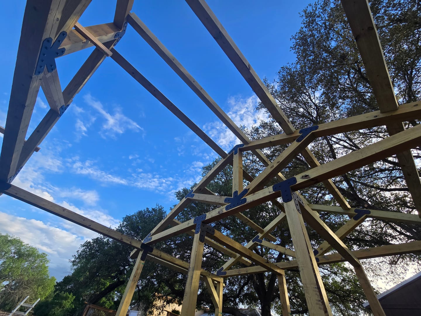Customer photo review of 4 inch truss plate set for 6 inch beams - King post with diagonals - overhang ends with bottom leg - chamfered