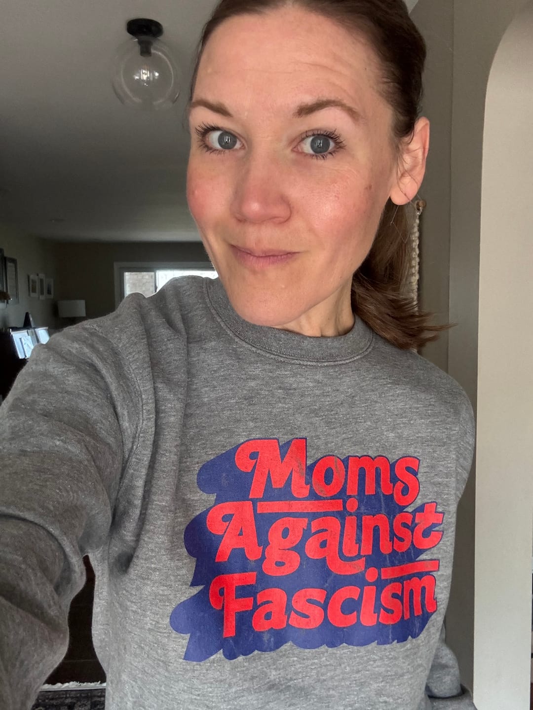 Customer photo review of Moms Against Fascism Vintage Washed Sweatshirt