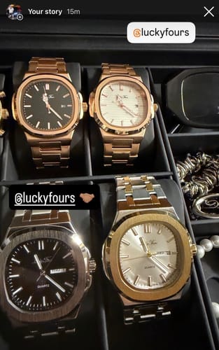 Customer's collection of four Lucky Fours® Brone watches in silver and rose gold finishes in a display case.