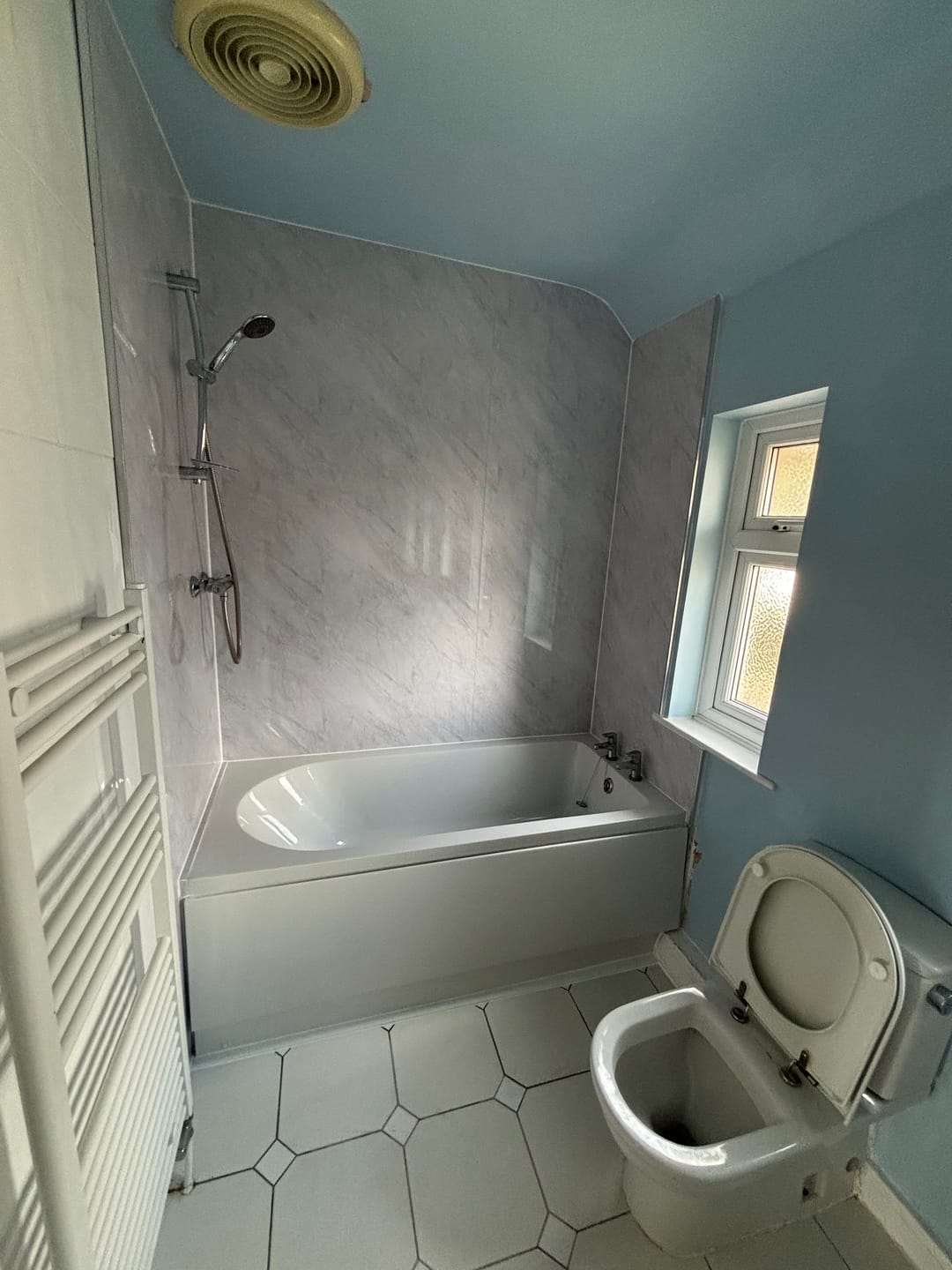 Customer photo review of Premium Grey Marble Gloss Shower Wall Panel – 1M x 2.4M